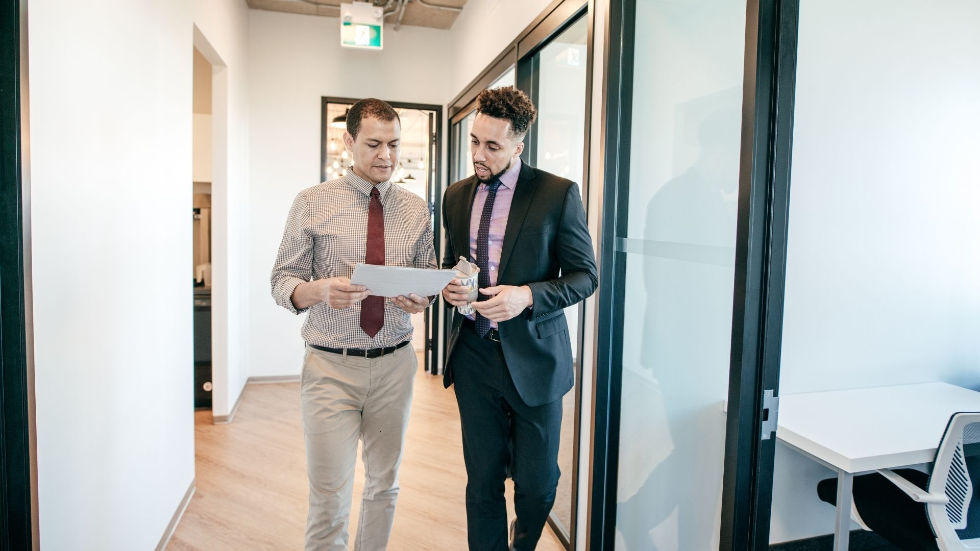 accountant and bookkeeper walking together