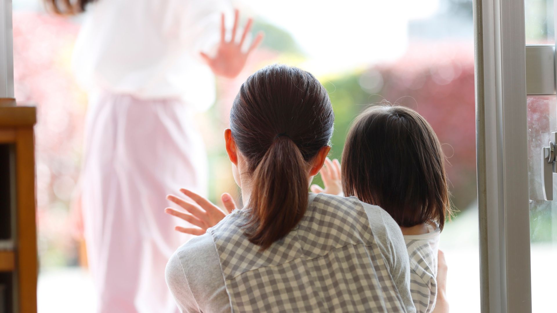 waving goodbye to a parent